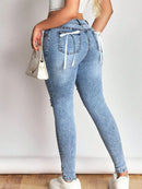 Distressed Skinny Jeans with Bow Back