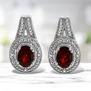.925 Sterling Silver Diamond Accent and 8x6mm Red Oval Garnet Stud Earrings (I-J Color, I1-I2 Clarity)