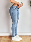 Distressed Skinny Jeans with Bow Back