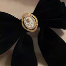 Black Velvet Cameo Hair Clip Bow