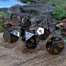 Black and Orange Sharp-Edged Metal Dice Set