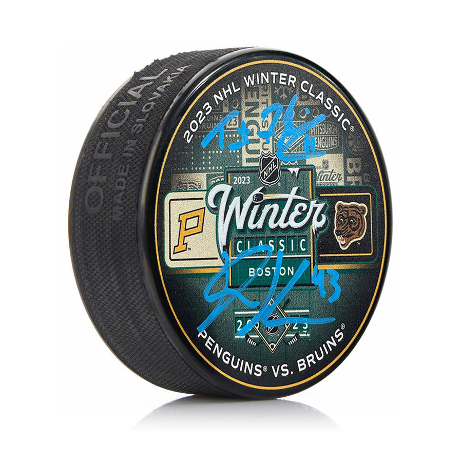 Trent Frederic & Danton Heinen Autographed Boston Bruins 2023 Winter Classic Hockey Logo Puck