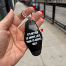 It's Better To Arrive Late, Than To Arrive Ugly Keychain in Black and White