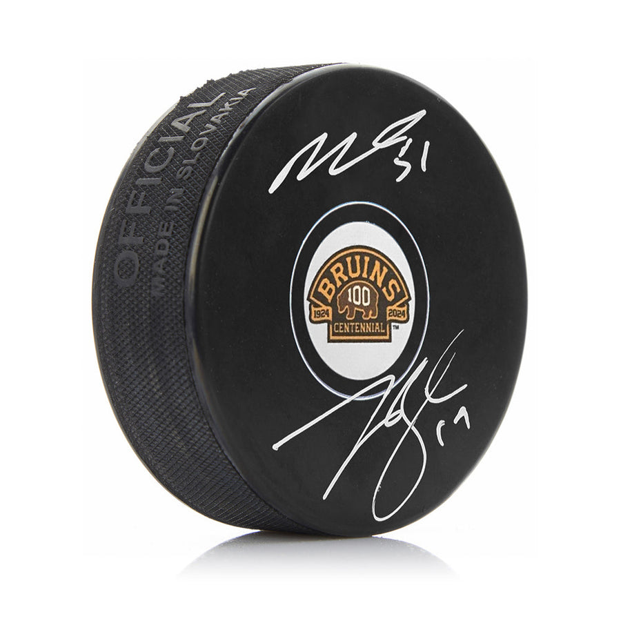 Matthew Poitras & Johnny Beecher Autographed Boston Bruins 100th Anniversary Hockey Logo Puck