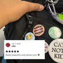 Regulate Guns Not Uteruses 1.25" Button in Groovy Flower Motif