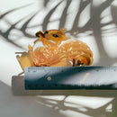 Velvet Claws Squirrel Holding Acorn Hair Claw