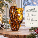 Spotted Leopard Cub Climbing Tree Glass Christmas Ornament