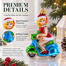 Girl Riding Scooter Glass Christmas Ornament