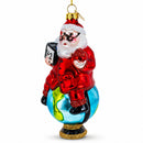 Teacher Santa on World Globe Glass Christmas Ornament