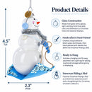 Snowman Riding a Sled Glass Christmas Ornament