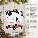 Spotted Cow Ice Skating Glass Christmas Ornament