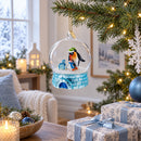 Penguins in the Igloo Dome Glass Christmas Ornament