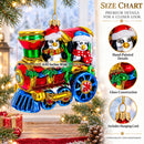 Playful Penguins Riding Train Glass Christmas Ornament