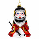 Santa in Ice Hockey Gear Glass Christmas Ornament