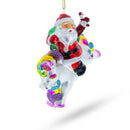 Santa Riding Rainbow Unicorn Glass Christmas Ornament