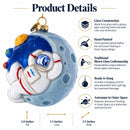 Astronaut Floating in Outer Space Glass Christmas Ornament