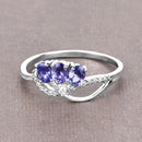 0.56 Carat Genuine Tanzanite and White Diamond 14K White Gold Ring