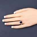 3.07 Carat Glass Filled Sapphire and White Zircon .925 Sterling Silver Ring
