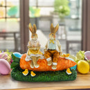 Bunny Couple in Love Sitting on a Carrot Figurine