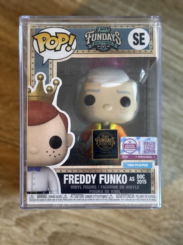 Fundays: Quest for the Grail - Atlantis 2026 Freddy Funko as Back to the Future Doc Brown 2015 (Orange Jacket) with Protector & Guaranteed Mint LE1150