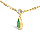 10K Yellow Gold Dangling 5x3 mm Green Emerald and Diamond Station Necklace - 18" Inches