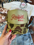 Raisin' Hell Green Camo Trucker Hat