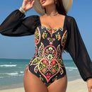 Long sleeved mesh one-piece swimsuit for women