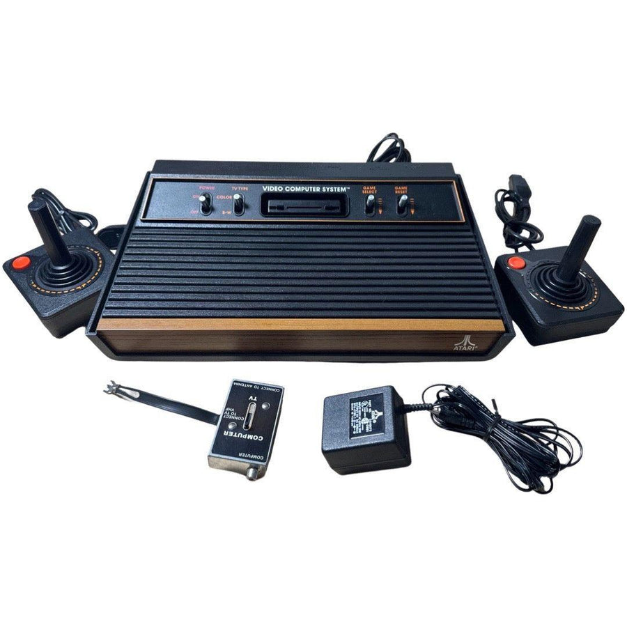 LOT Console en boite Atari CX 2600 woody retro vintage avec 7 jeux LOT Console en boite Atari CX 2600 woody retro vintage avec 7 jeux