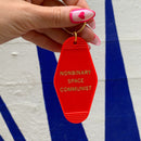 Nonbinary Space Communist Motel Style Keychain in Red and Gold