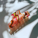 Velvet Claws Hair Clip | The Psychedelic in Wavy Tangerine | Claw Clip in Velvet Travel Bag