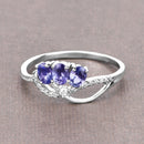 0.56 Carat Genuine Tanzanite and White Diamond 14K White Gold Ring