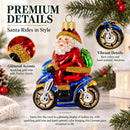 Santa on Motorcycle with Green Backpack Glass Christmas Ornament