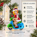 Girl Riding Scooter Glass Christmas Ornament