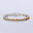 12.33 Carat Genuine Orange Sapphire and White Diamond 14K White Gold Bracelet