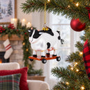 Spotted Cow Ice Skating Glass Christmas Ornament