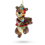 Bear Engaged in Football Blown Glass Christmas Ornament