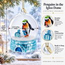 Penguins in the Igloo Dome Glass Christmas Ornament