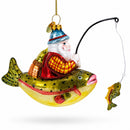 Santa Fishing on Boat Glass Christmas Ornament