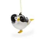 Playful Penguin Skating Blown Glass Christmas Ornament