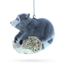 Playful Racoon on a Log Blown Glass Christmas Ornament