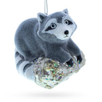 Playful Racoon on a Log Blown Glass Christmas Ornament