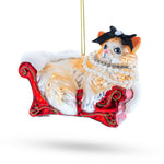 Cat in Pearl Necklace Lounging on Sofa Blown Glass Christmas Ornament