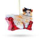 Cat in Pearl Necklace Lounging on Sofa Blown Glass Christmas Ornament
