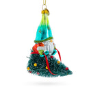 Gnome Adventurer Riding a Festive Tree Blown Glass Christmas Ornament