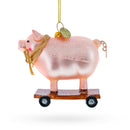 Playful Pig Riding a Skateboard Glass Christmas Ornament