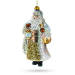 Glittered Santa Holding a Magical Lantern Blown Glass Christmas Ornament