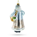 Glittered Santa Holding a Magical Lantern Blown Glass Christmas Ornament