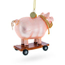 Playful Pig Riding a Skateboard Glass Christmas Ornament