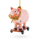 Playful Pig Riding a Skateboard Glass Christmas Ornament