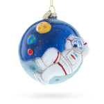 Astronaut on a Moon Blown Glass Christmas Ornament